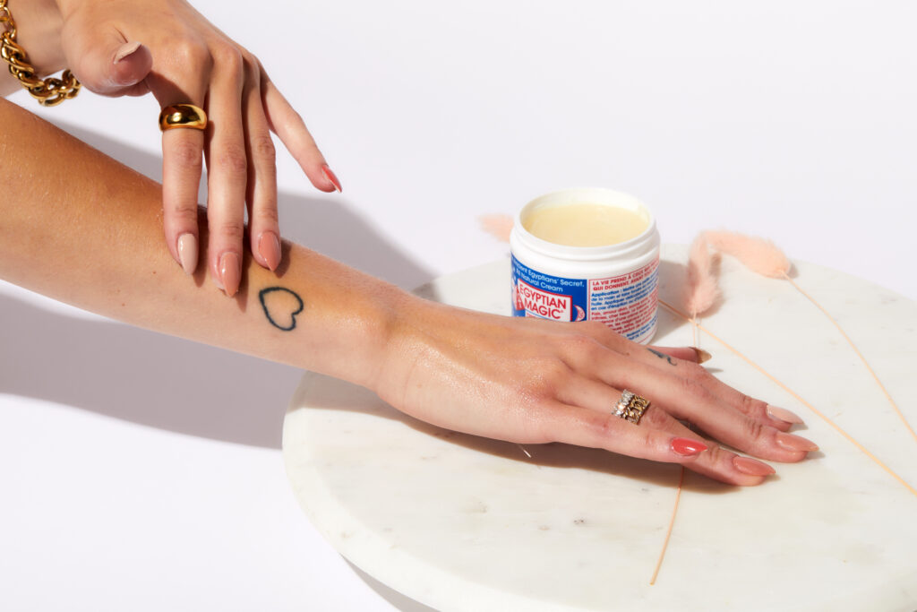 Egyptian Magic light application on hands and arms